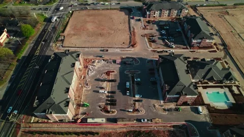 Green Lifting equipment in action, construction site for residential home Stock Footage 270048244