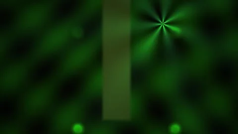 Green light beam shining through dark background with bokeh effect. Stock Footage 336702043