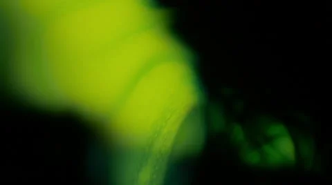 Green Light Piercing Through Infinite Blackness Stock Footage 62391511