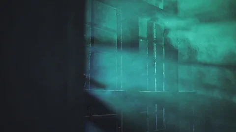 Green light rays behind the window (closeup version 2) Stock Footage 105303709