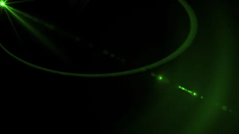 Green light rays with lens flares art animation background on black backgroun Видео 275246766