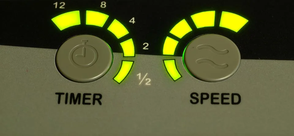 Green light speed and timer buttons as background Stock Photos