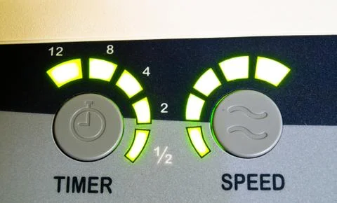 Green light speed and timer buttons as background Stock Photos