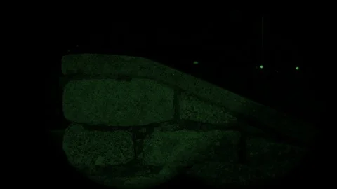 Green Light with Spooky Shadows Moving Across the Wall at Night Time Stock Footage 122529111