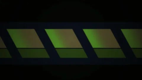 Green light through rectangular windows. Video stock 335112870