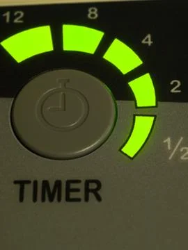 Green light timer button as background Stock Photos