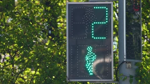 A Green light of Traffic Light in the City with green background. Croosing road Video stock 240924801