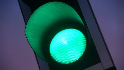 Green light at traffic light at twilight united kingdom Stock Footage 123408330