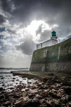 Green Lighthouse of the jetty Stock Photos