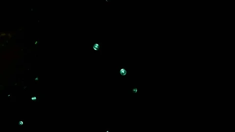 Green lights on black background. Texture Stock Footage 100369448