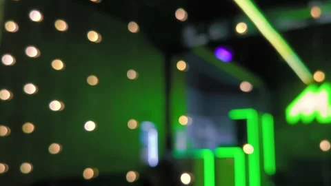 Green lights on a dark background Stock Footage 283830567