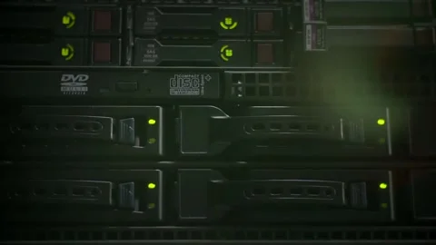 The green lights flash on the data store in the server room Video stock 100643413