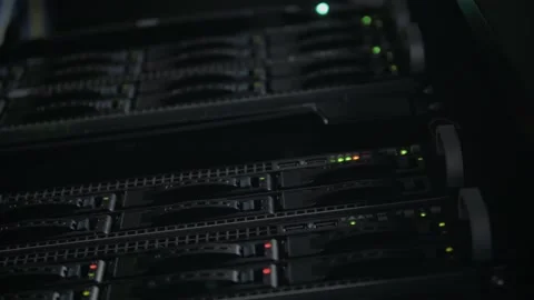 The green lights flash on the data store in the server room Video stock 116204147