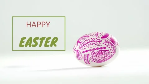 Green line drawing frame as painted egg rolling in, settling, showing Easter Stock Footage 330508816