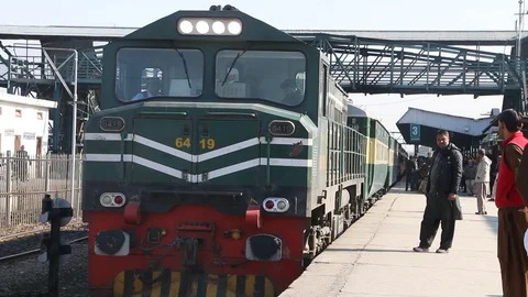 Green Line Express train waiting for passengers at Rawalpindi Railway Station Stock Footage 86656399