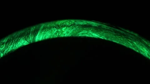 Green liquid arch, green light on a dark background, line of light Stock Footage 291468439