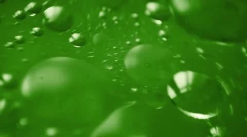Green liquid with bubbles Stock Footage 20646809