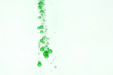 Green liquid bubbles Stock Photos