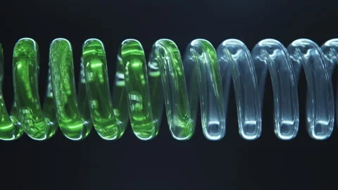 Green liquid flows down a glass spiral pipe. Stock Footage 249804920