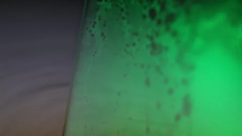 Green liquid reflection, perfect surface movement Stock Footage 298707714