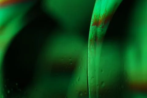 Green liquid surface, phenomenal structure, macro abstraction Stock Photos