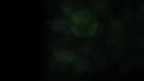 Green, low light, Bokeh, light, black background Stock Footage 319954904