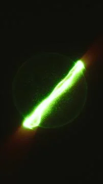 Green luminous particle wave crossing a dark sphere, forming a futuristic d.. イラスト素材