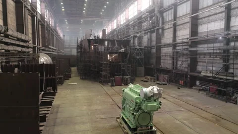Green main engine on pallets near fishing vessel in dry dock Vídeos de archivo 158944602