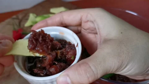 Green Mango and Cooked Shrimp Paste Stock Footage 231119064