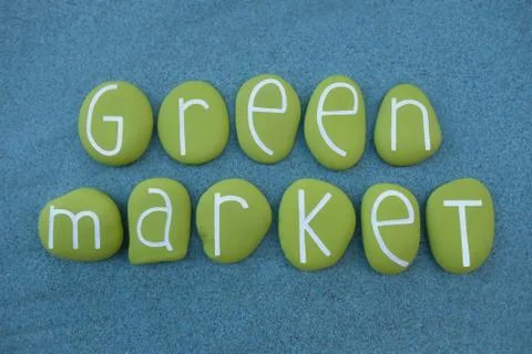 Green Market, creative text composed with green colored stone letters Stock Photos