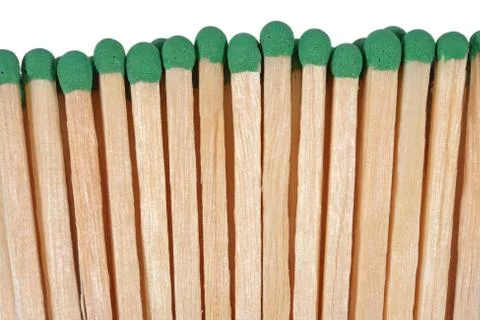 Green match on a white background Stock Photos