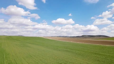 Green Meadows And Cloudy Blue Sky Stock-Footage 332837395
