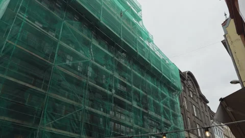 Green mesh and scaffolding grid, abstract texture study of renovation materials Stock Footage 332736472
