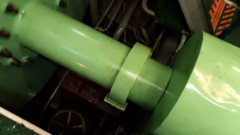 Green metal rotating part of engine transmitting mechanism Stock Footage 116608944