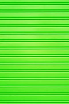 Green metal security roller door background Stock Illustration