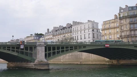 Green metal structures of the arch bridge the Pont de Sully. Stock Footage 308728556