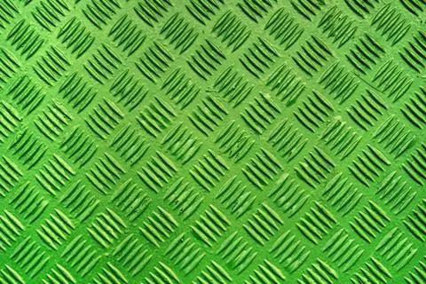 Green metal surface background with repeative diamond pattern Stock Photos