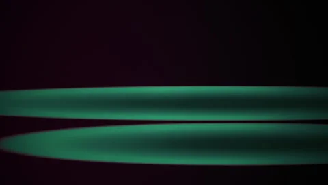 Green metallic objects on black background. Stock Footage 334885986