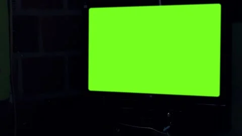 Green Mock-up Screen TV Set on a Dark Room. Zoom In. Stock Footage 99613331