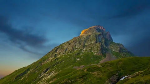 Green mount top on blue sky background Stock Footage 250155606