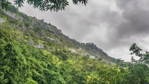 Green mountain and cloudy sky time lapse Video stock 122344139