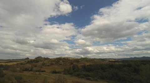 Green Mountain grass and cloudy blue sky Time Lapse Stock-Footage 54318622