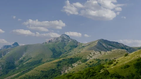 Green mountain ridge under a cloudy sky Stock-Footage 120254774