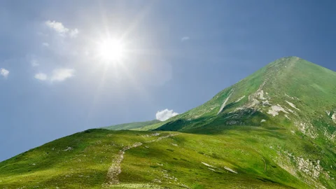 Green mountain at the summer day time lapse scene Stock Footage 165348581