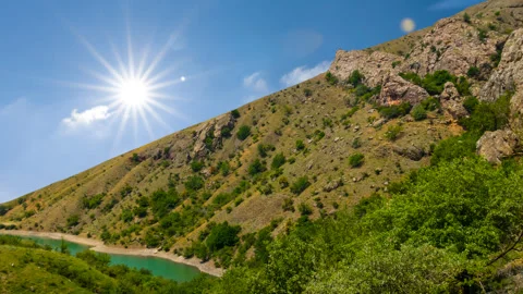 Green mountain at the sunny day Stock Footage 258301409