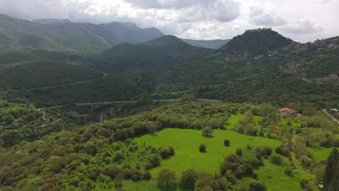 Green Mountain Valley and Hillside Village in Peloponnese Stock Footage 337088224
