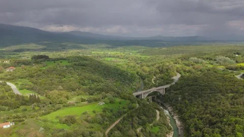Green Mountain Valley With Bridge and Storm Clouds in Peloponnese Stock Footage 337088351