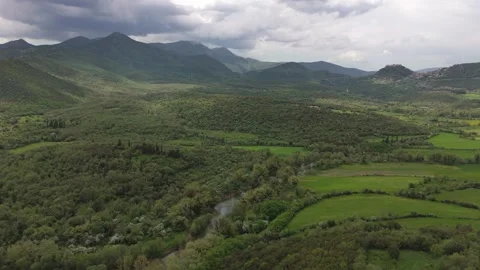 Green Mountain Valley With River and Storm Clouds in Greece Stock Footage 337165274