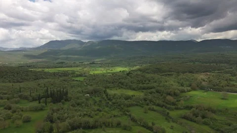 Green Mountain Valley With Storm Clouds in Peloponnese Stock Footage 337088647