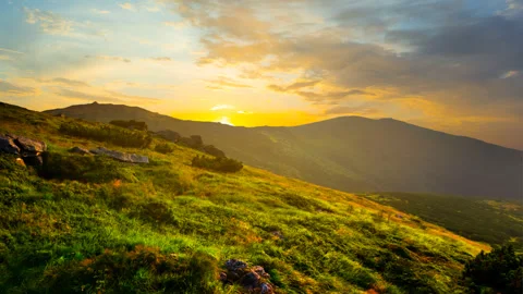 Green mountain valley at the sunset time lapse scene Video stock 172346029